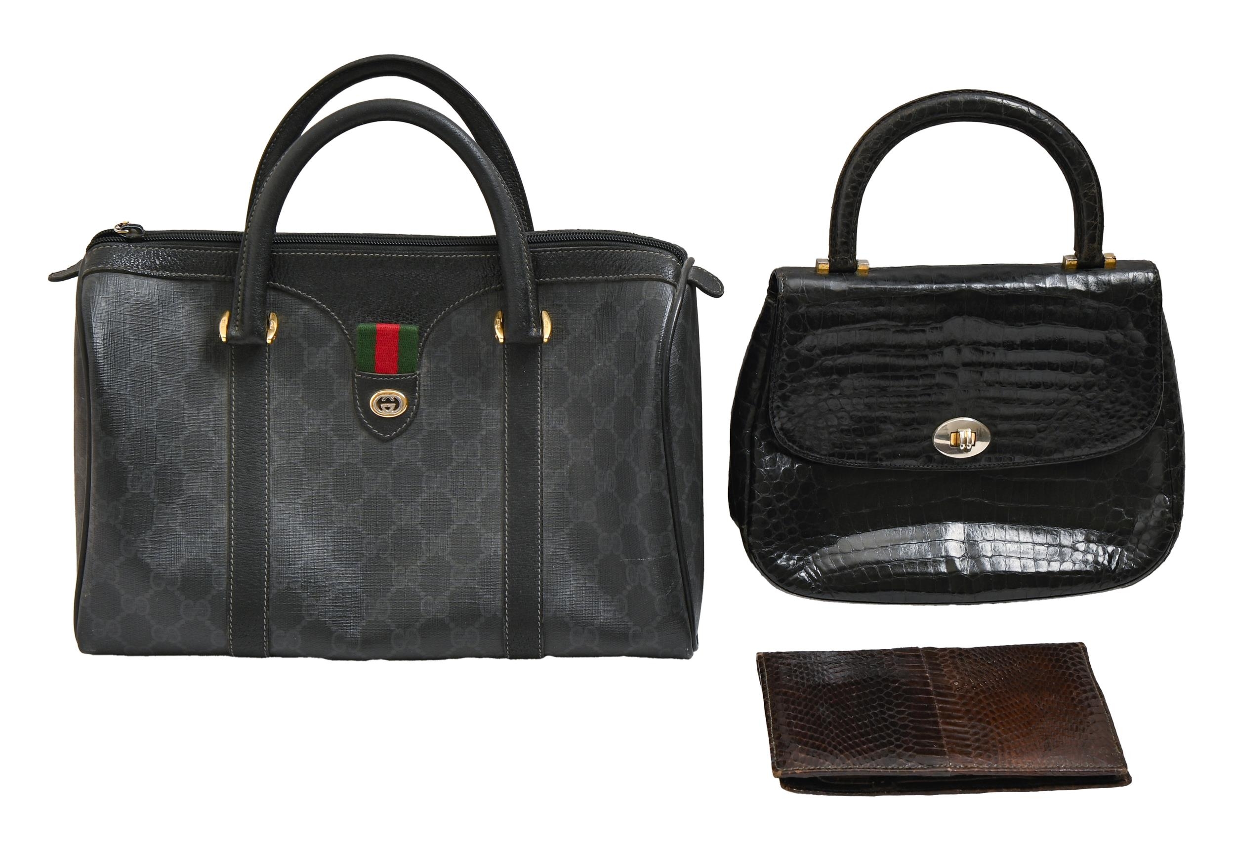 Fashion accessories. A Gucci handbag, another handbag and a snakeskin wallet (3) Good second hand