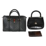 Fashion accessories. A Gucci handbag, another handbag and a snakeskin wallet (3) Good second hand