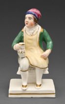 A Staffordshire porcelain figure of Souter Johnnie, c1840, 11.5cm h Minute chip on one corner of