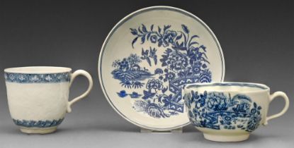 A Worcester chrysanthemum moulded blue and white coffee cup, c1770, painted open crescent and a