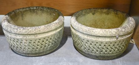 A pair of reconstituted stone garden planters by The Cotswolds Studios Ltd, 32cm h; 54cm diam