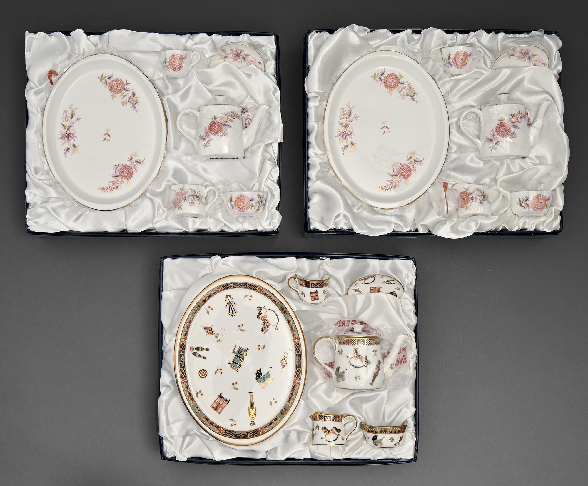 Three Royal Crown Derby miniature tea services, early 21st c, including Treasures of Childhood, each