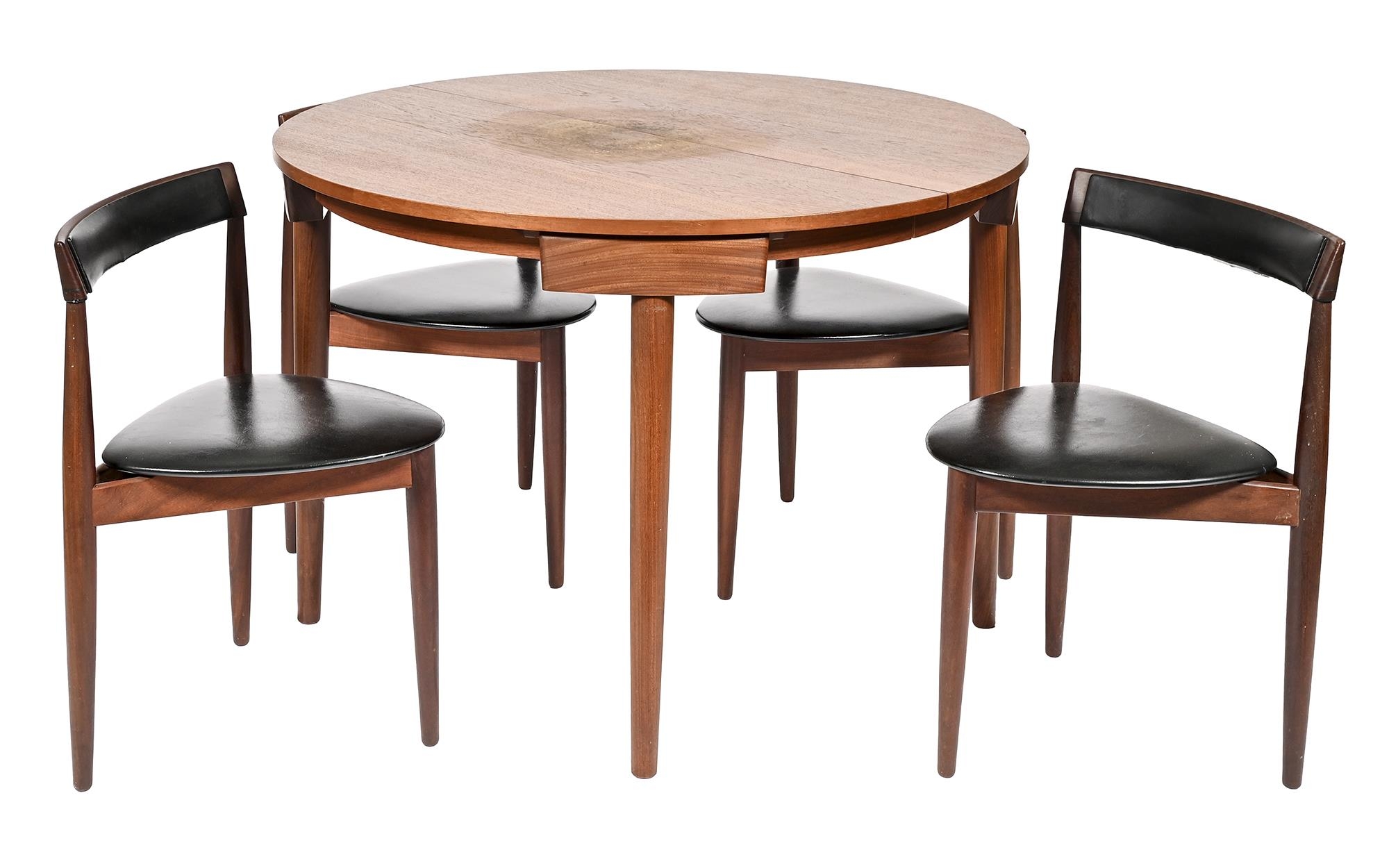 A Danish mid century teak extending dining table and set of four chairs,  chairs stamped Fren