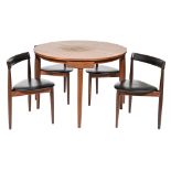 A Danish mid century teak extending dining table and set of four chairs,  chairs stamped Fren