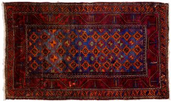 A Persian rug, 228 x 136cm and two runners, 294 x 102cm and smaller