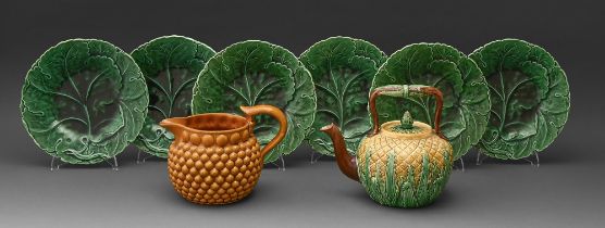 A Victorian majolica pineapple tea kettle and cover, late 19th c, 19cm h, an ochre majolica jug