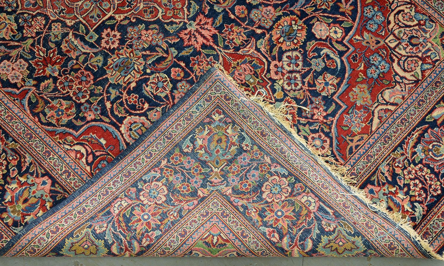 A Kashan rug, second quarter 20th c, 133 x 205cm Fair - good condition with wear at one end - Image 2 of 2