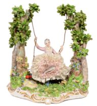 An Italian porcelain figure of a girl on a swing, 20th c, 28cm h, painted Made in Italy