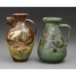 English art pottery. Two C H Brannam slipware jugs, decorated by James Dewdney or by Frederick