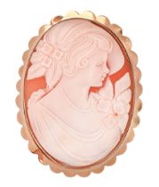 A cameo brooch, the oval shell carved with the head of a lady, mounted in gold, 62mm, marked 9k, 14g