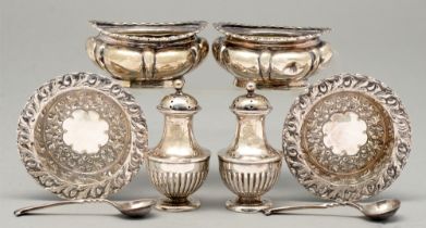 A pair of Victorian silver vase shaped pepperettes, crested, 62mm h, by Henry Matthews, Birmingham