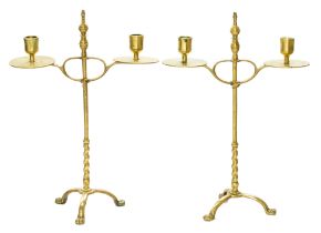 A pair of English brass adjustable candelabra, c1900,  on domed tripod, 38cm h