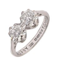 A diamond ring, with round brilliant cut diamonds, in 18ct white gold, Birmingham 1977, 3.4g, size K