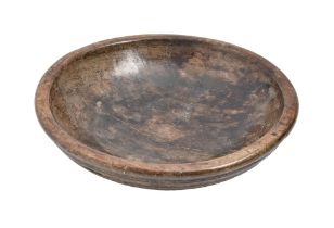 Treen. An English turned sycamore nixing bowl, 19th c or earlier, 33.5cm diam Typical wear