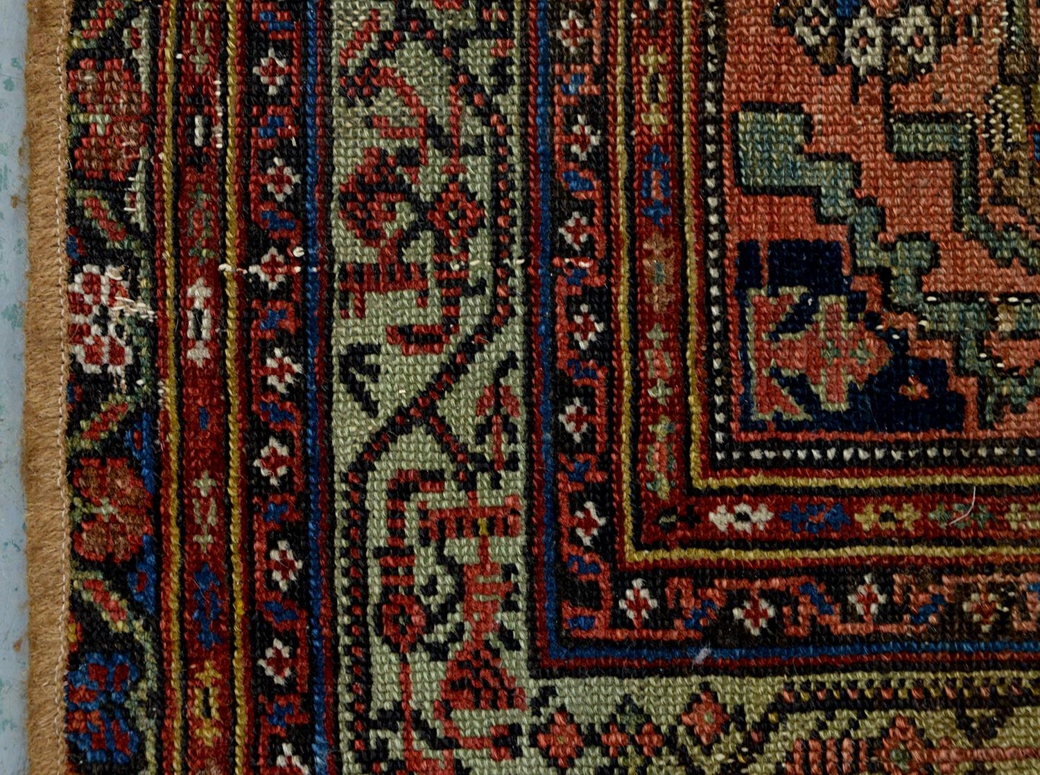 A Persian rug, 228 x 136cm and two runners, 294 x 102cm and smaller - Image 21 of 23