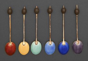 A set of six George V silver gilt and harlequin guilloche enamel coffee spoons, with bean