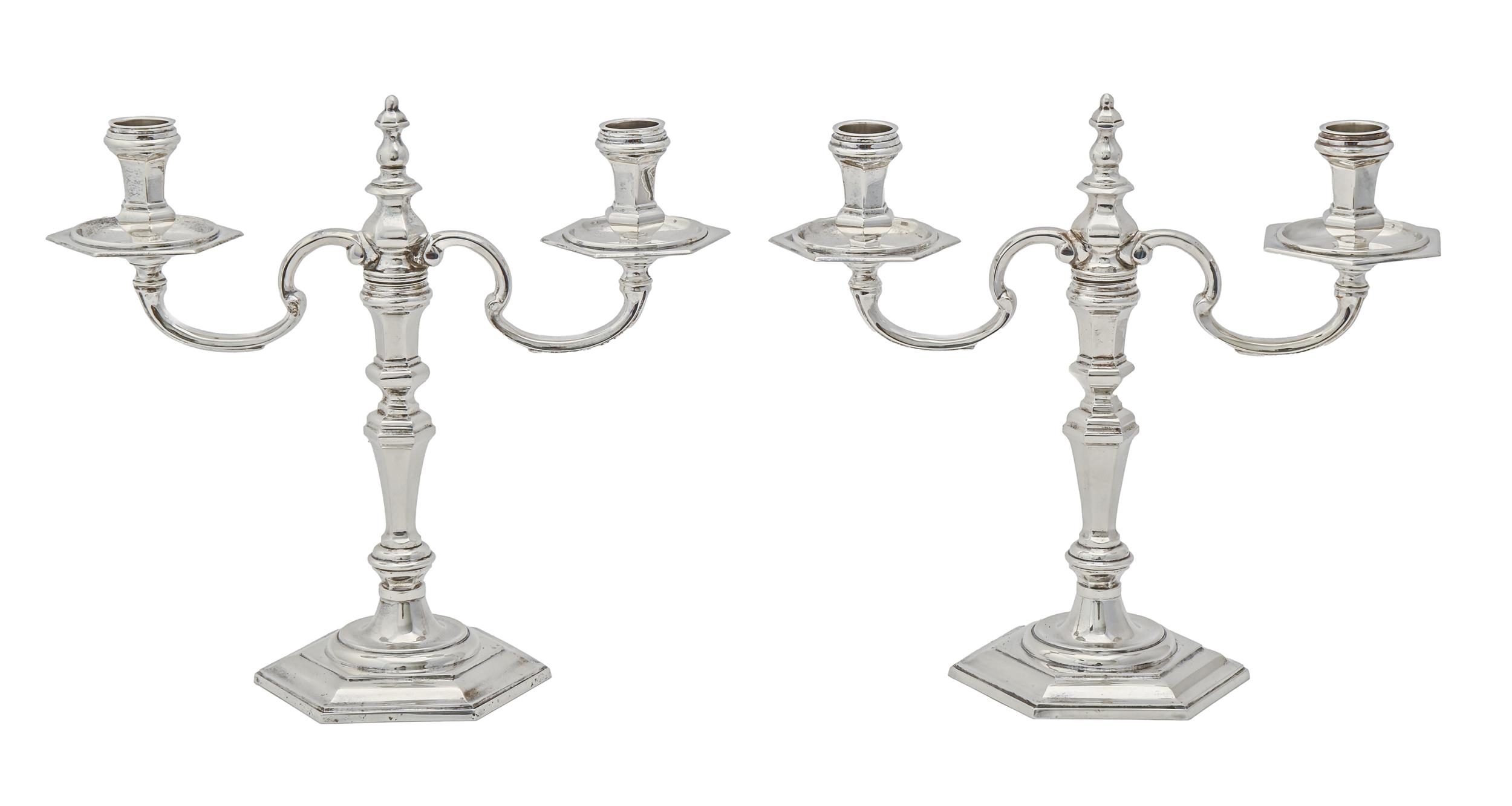 A pair of Elizabeth II silver candelabra, of hexagonal shape, in George II style, 26cm h, by C J