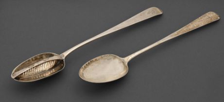 An Irish George III silver straining spoon and a gravy spoon en suite, of Irish pointed Old