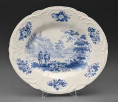 A Staffordshire blue printed pearl ware Villager pattern moulded meat dish, early 19th c, 36.5cm