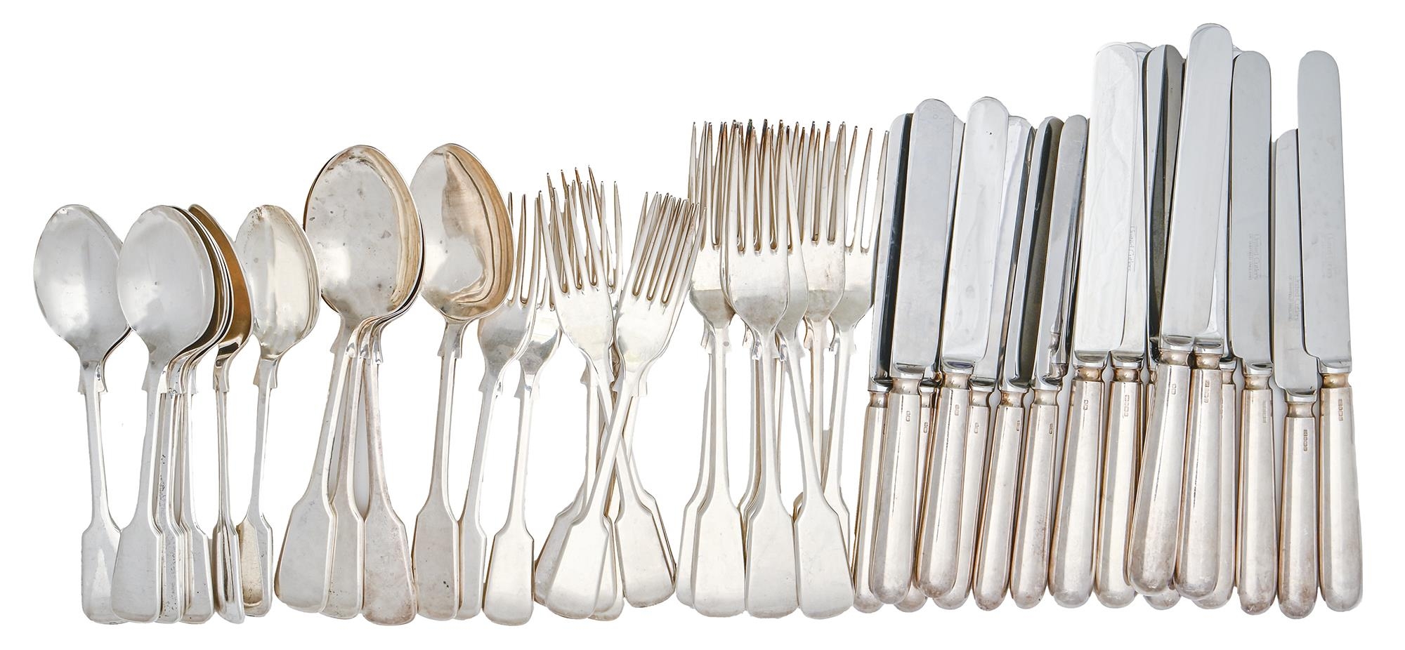 An Elizabeth II silver table service, Fiddle pattern, including silver hafted table and cheese