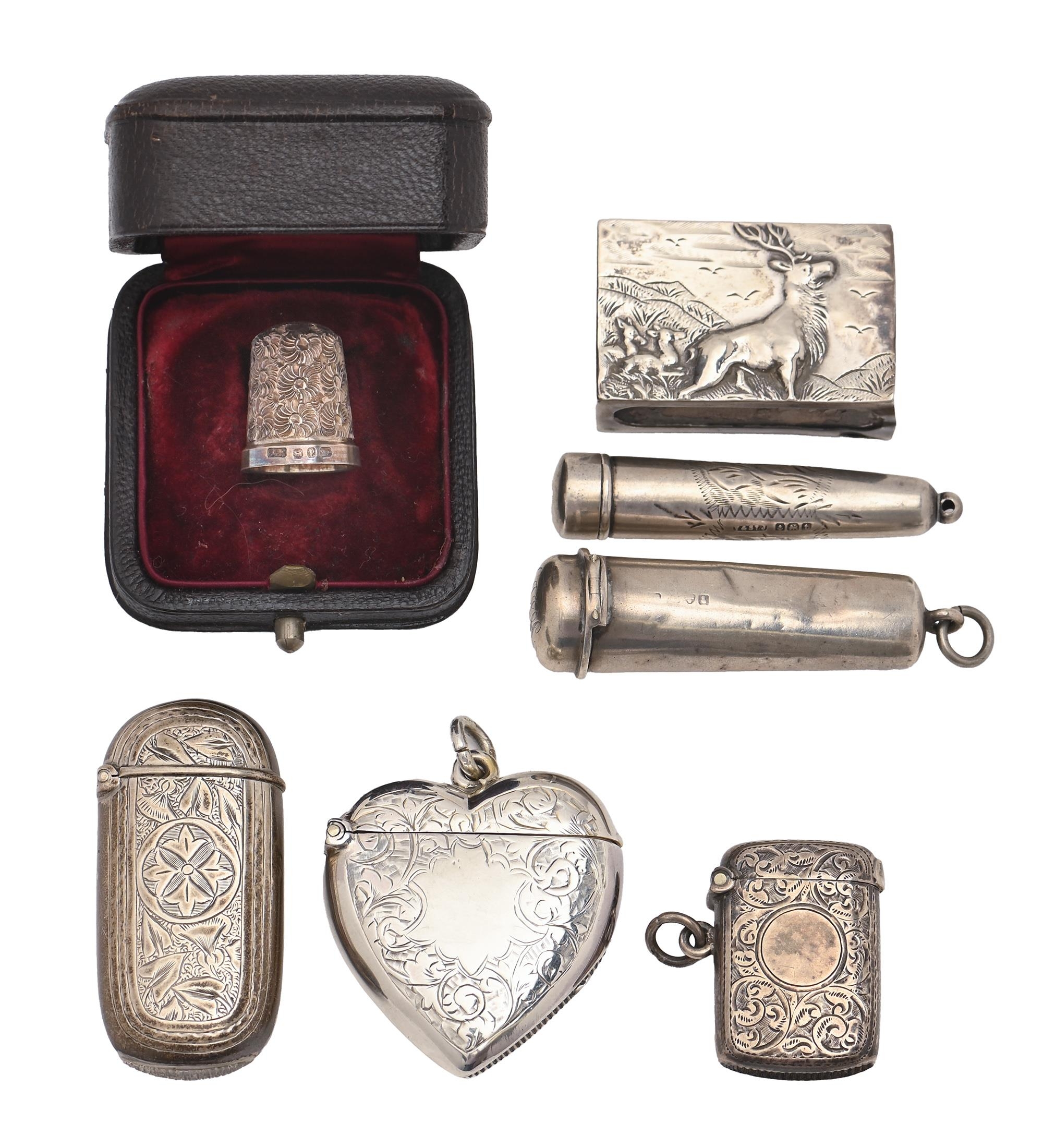 An Edwardian heart shaped silver vesta case, 46mm h, by Thomas Hayes, Birmingham 1902, a Victorian