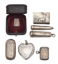 An Edwardian heart shaped silver vesta case, 46mm h, by Thomas Hayes, Birmingham 1902, a Victorian