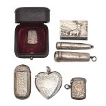 An Edwardian heart shaped silver vesta case, 46mm h, by Thomas Hayes, Birmingham 1902, a Victorian