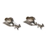 A pair of Continental miniature cast silver sleigh salt cellars, 90mm l, import marked Samuel