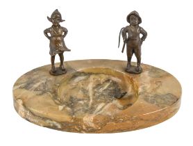 An Art Deco bronze mounted siena marble ashtray, c1930, designed as a pond set with the figures of a