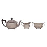 An Elizabeth II silver tea service, with gadrooned rim, on bun feet, teapot 14.5cm h, by Elkington &