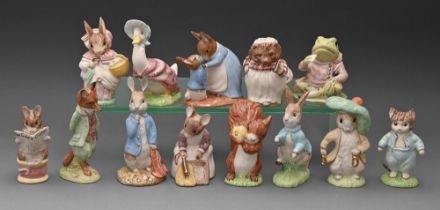 Thirteen Royal Doulton Beswick ware Beatrix Potter figures, late 20th c, 18cm h and circa, printed