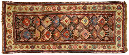 An antique Kazak runner, c1910, 115 x 255cm Fair - good condition