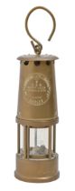 A brass miner's safety lamp