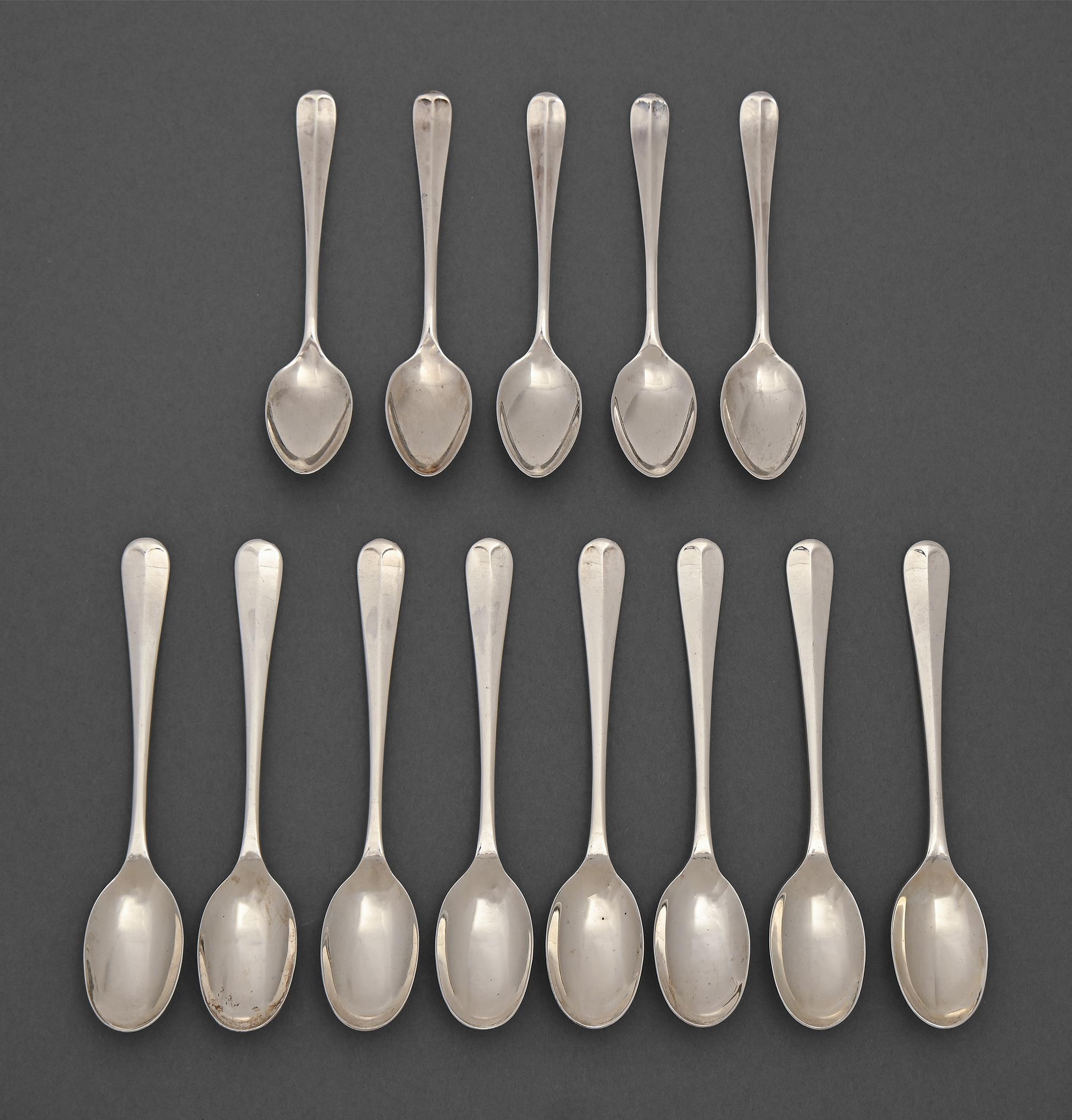 A set of eight Elizabeth II silver teaspoons, Hanoverian pattern with rat tail, by Universal Cutlers