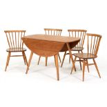 An Ercol mid-century drop leaf dining table and a set of four chairs, table 72cm h Table with