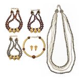 Costume jewellery. Four mid-century Coppola e Toppo necklaces, a collar and pair of ear clips,