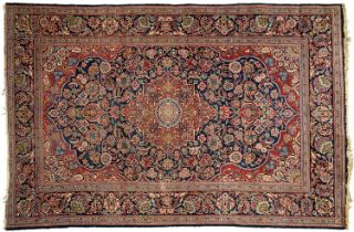 A Kashan rug, second quarter 20th c, 133 x 205cm Fair - good condition with wear at one end