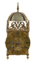 An English brass lantern clock, c1900, in 17th c style, pendulum and key, 36cm h; 17cm w over dial