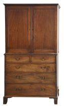 A Victorian mahogany linen press, the associated upper part fitted with two adjustable sliding