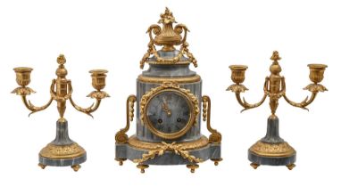 A French ormolu mounted bleu turquin marble garniture de cheminee, late 19th c, in Louis VI style,