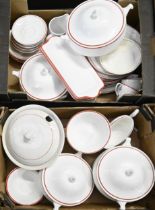 A Staffordshire red banded white earthenware dinner service