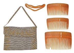 A set of four blond tortoiseshell and pique point combs and a slide, early 20th c, a 1920s metal