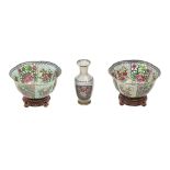A pair of Chinese plique a jour enamel bowls and a vase, 20th c, bowl 18cm diam, wood stands and
