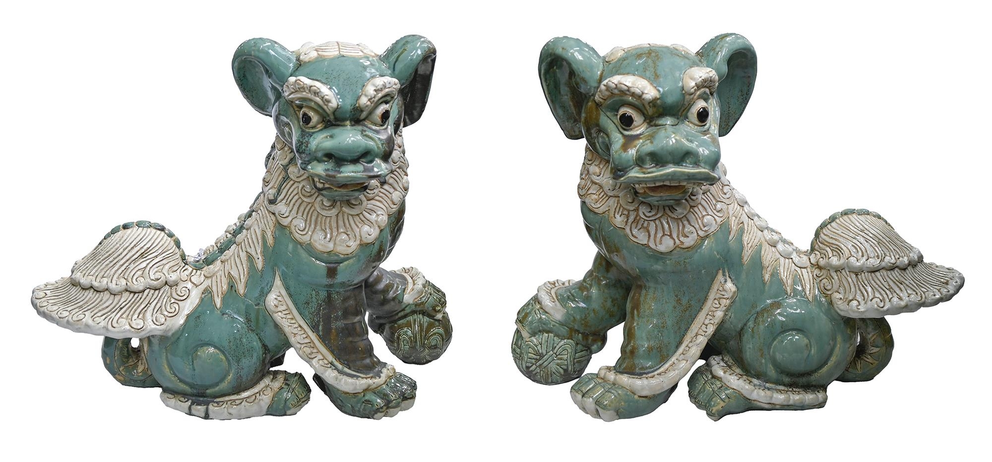 Garden ornaments. A pair of South East Asian glazed pottery dogs of Fo, late 20th c, 52cm h Both