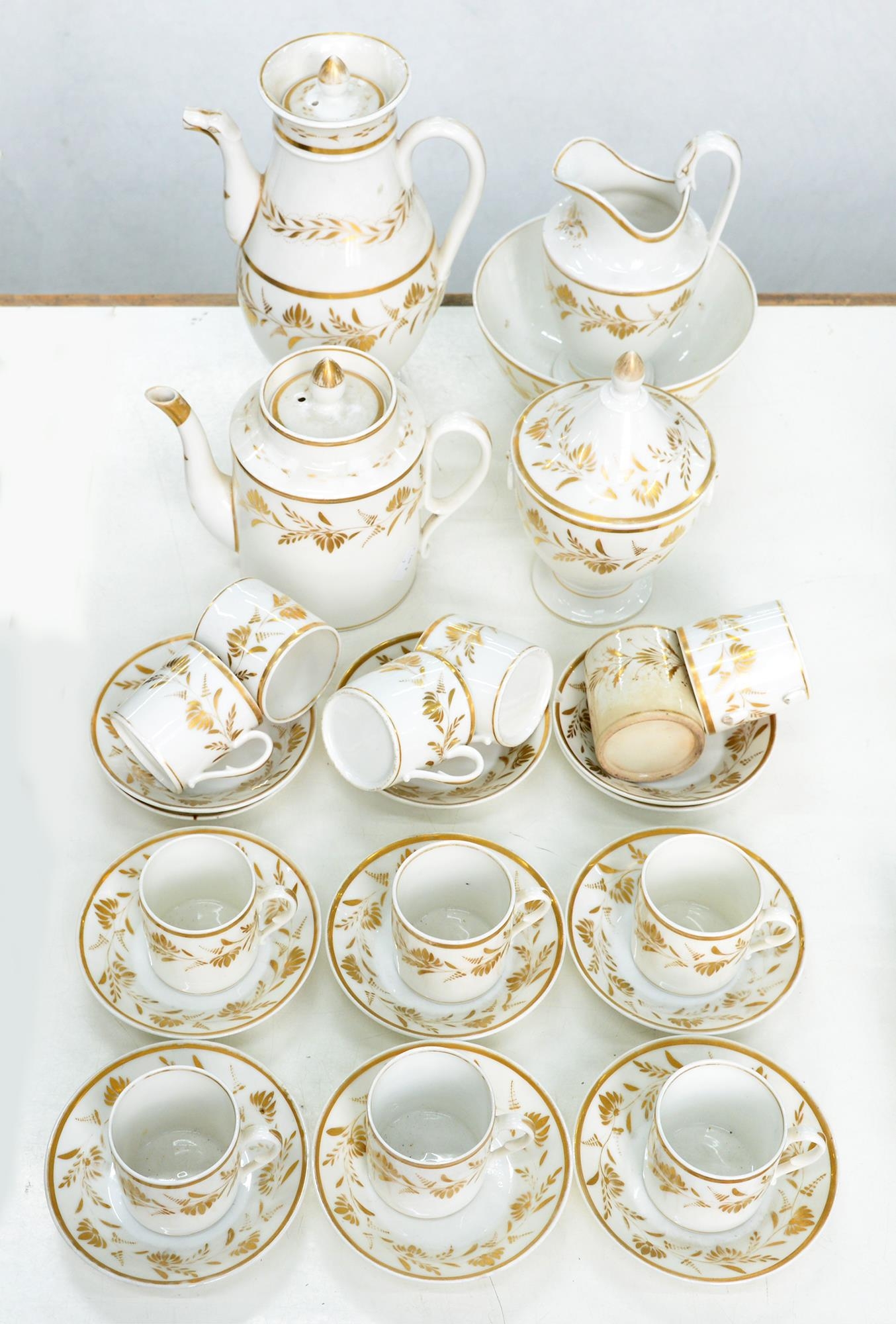 A Continental white and gilt hard-paste porcelain coffee service, possibly Paris, c1810, coffee