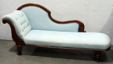 A Victorian mahogany chaise longue, on turned legs