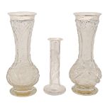 A pair of silver mounted cut glass vases, one damaged and smaller engraved glass cylindrical vase