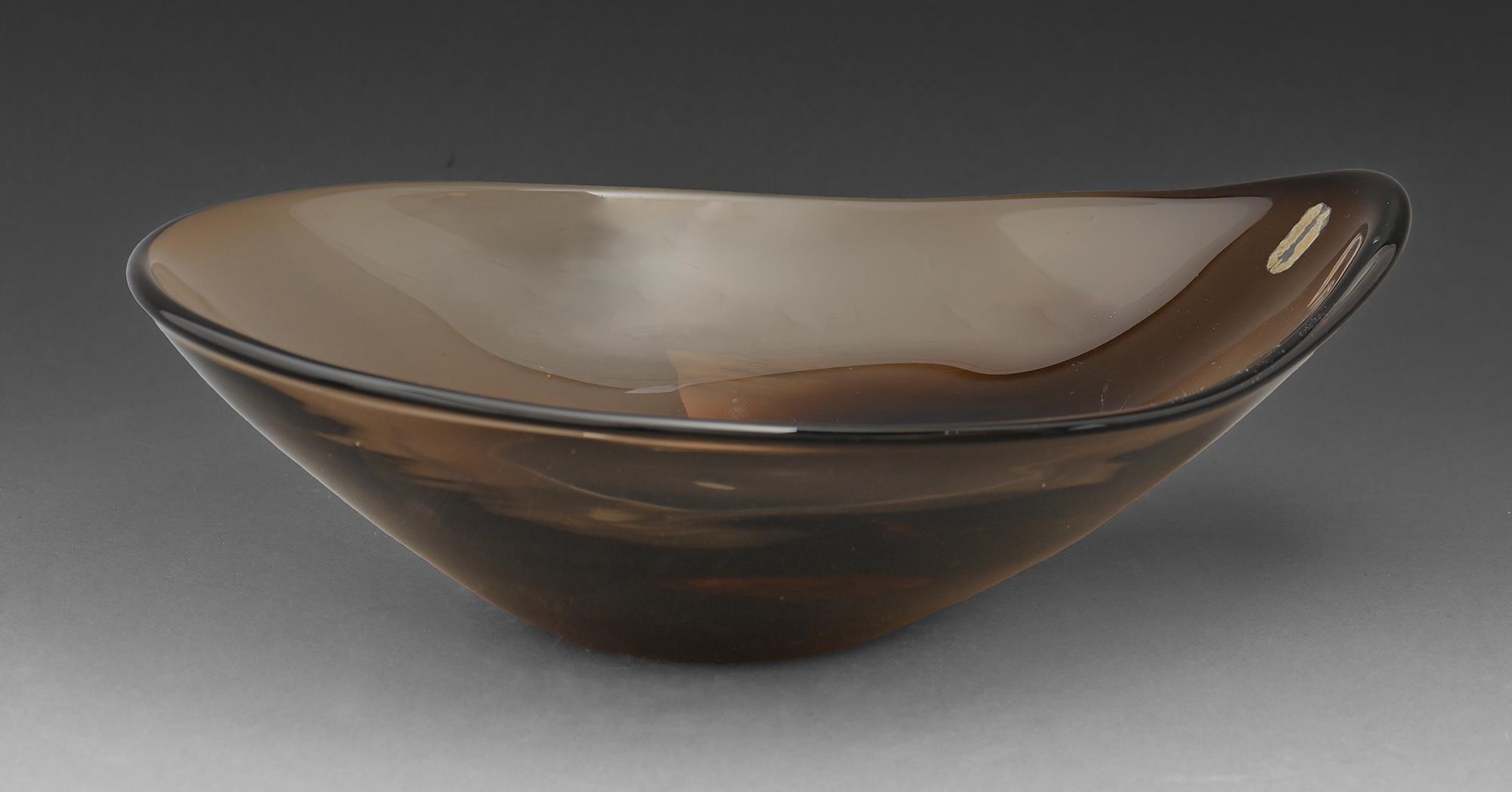 A Whitefriars cinnamon glass bowl, c1970, 30cm l, part paper label Slightly scratched