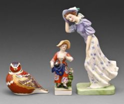 A Royal Doulton bone china figure of Windflower, a smaller German figure of a girl and a Royal Crown