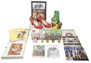 Wizard of Oz. A musical painted resin and glass group and other related merchandise, recent